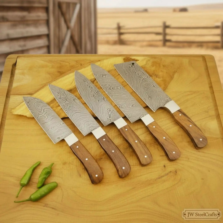 Modern chef knives with natural wood grips and polished steel bolsters.