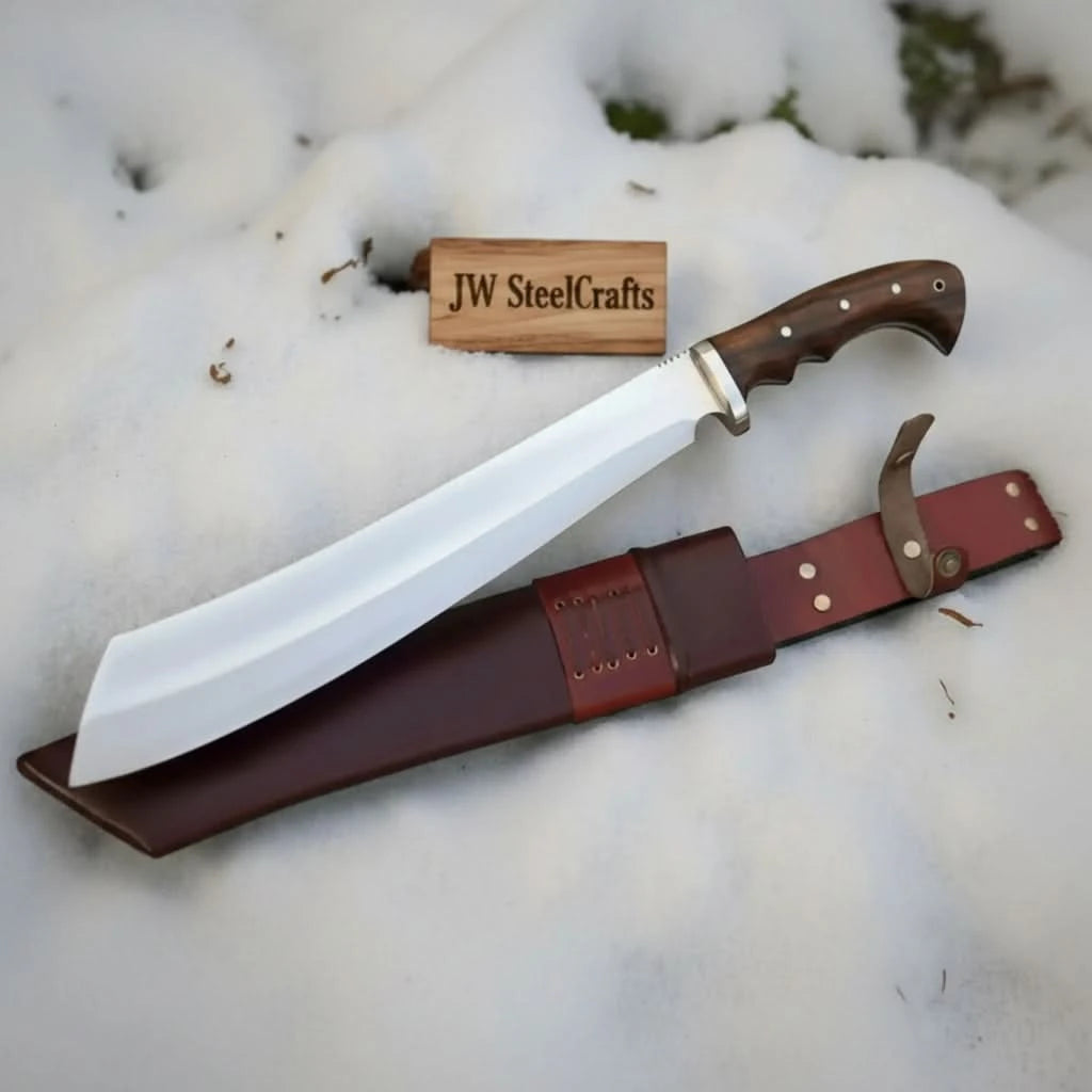     Snow display Bowie knife featuring polished steel blade and premium leather sheath styling