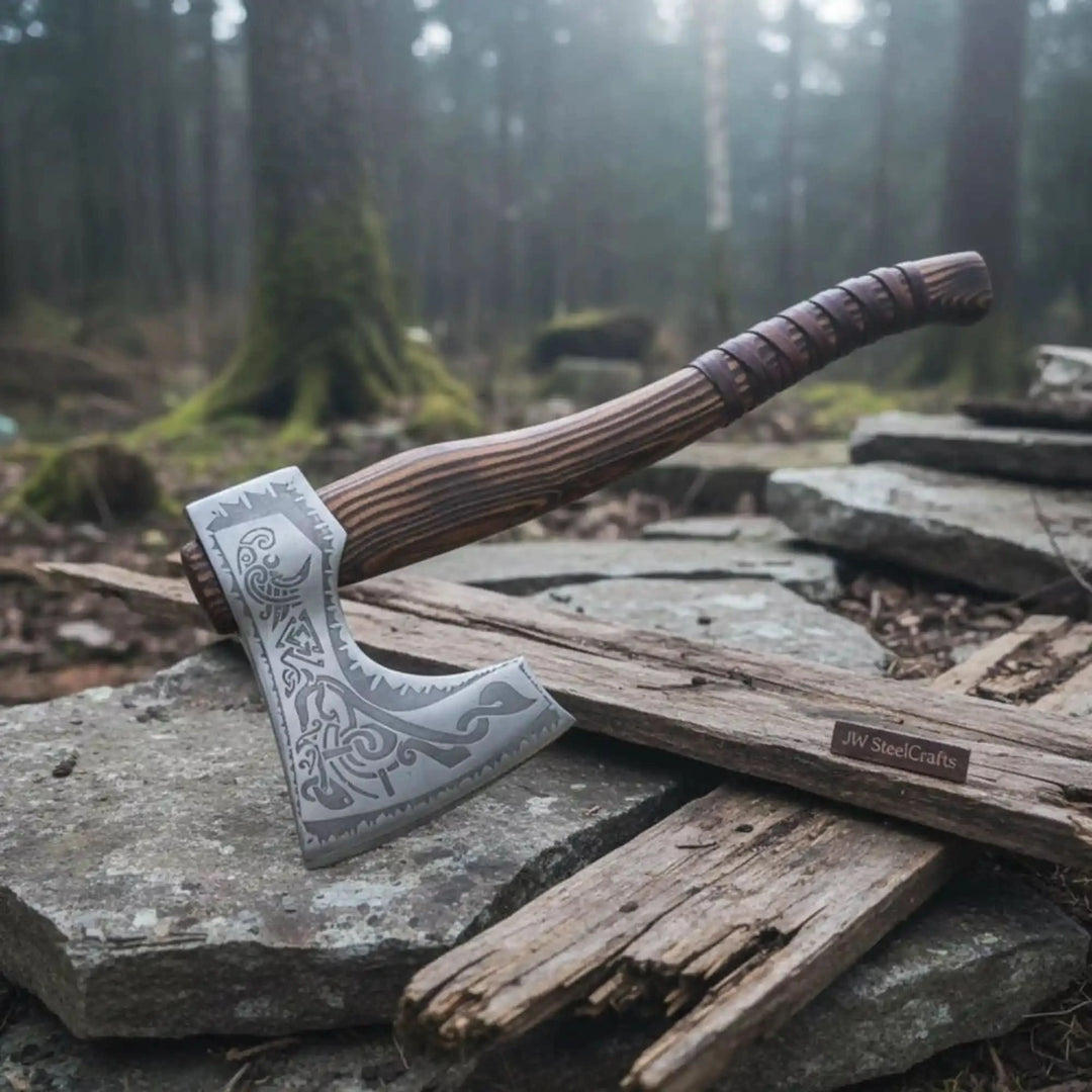 Horizon-inspired Nordic engraved axe displaying polished steel blade patterns and wrapped wood textures.