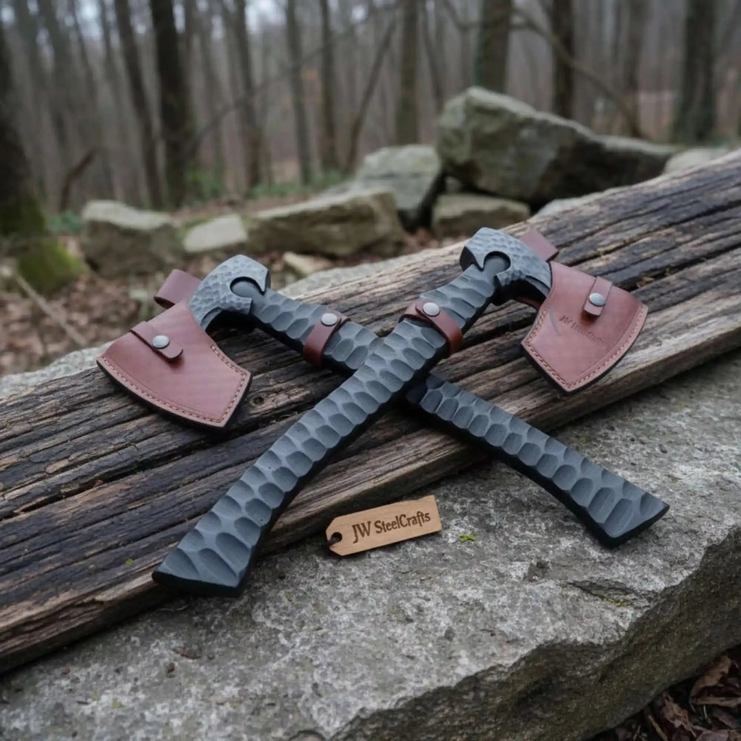 Hearthveil-themed Nordic forged axes with artistic steel textures and rugged outdoor forest presentation.