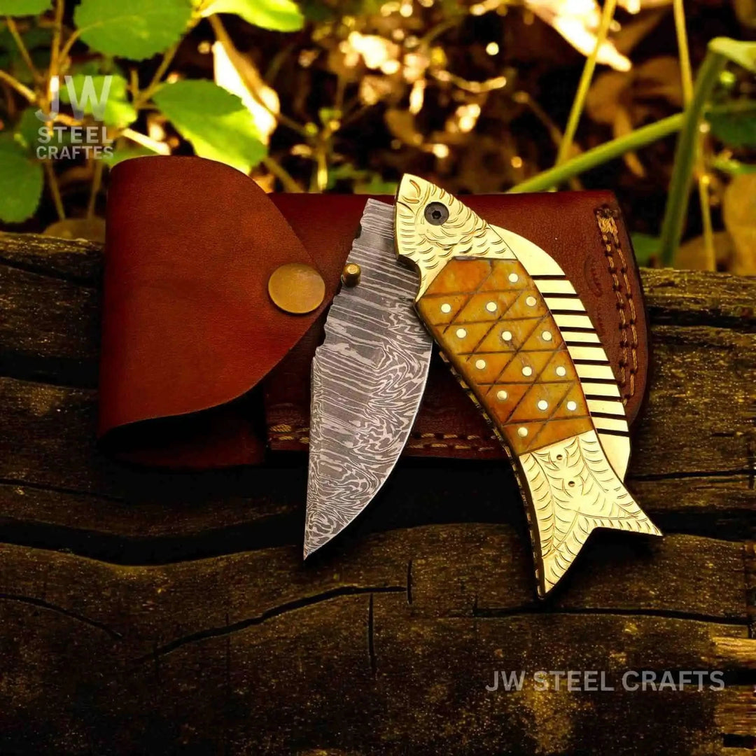     Exclusive EDC fish knife featuring engraved metal details and handcrafted outdoor carry appearance