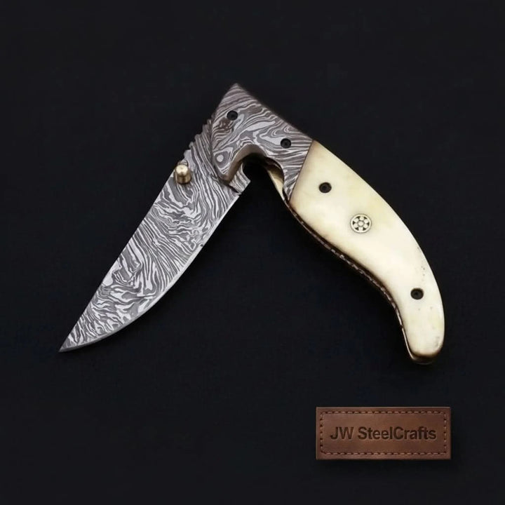     compact Damascus folding knife for everyday carry with premium handcrafted steel blade artistry