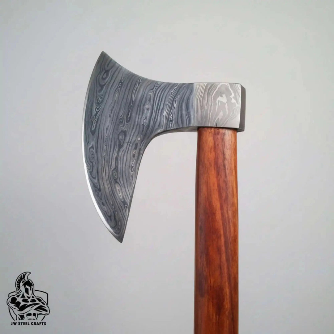 Highforge-themed Nordic woodland axe showcasing handcrafted curved steel blade and rustic forest setting.