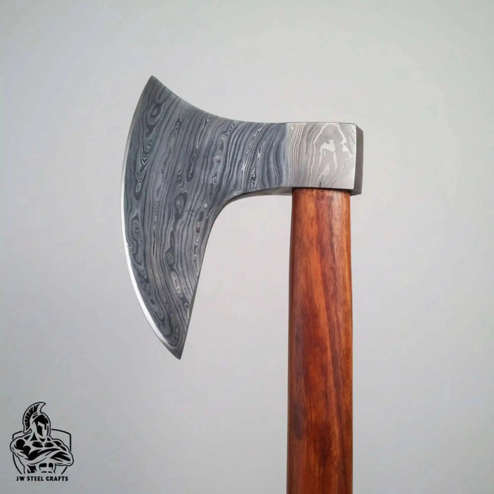 Highforge-themed Nordic woodland axe showcasing handcrafted curved steel blade and rustic forest setting.