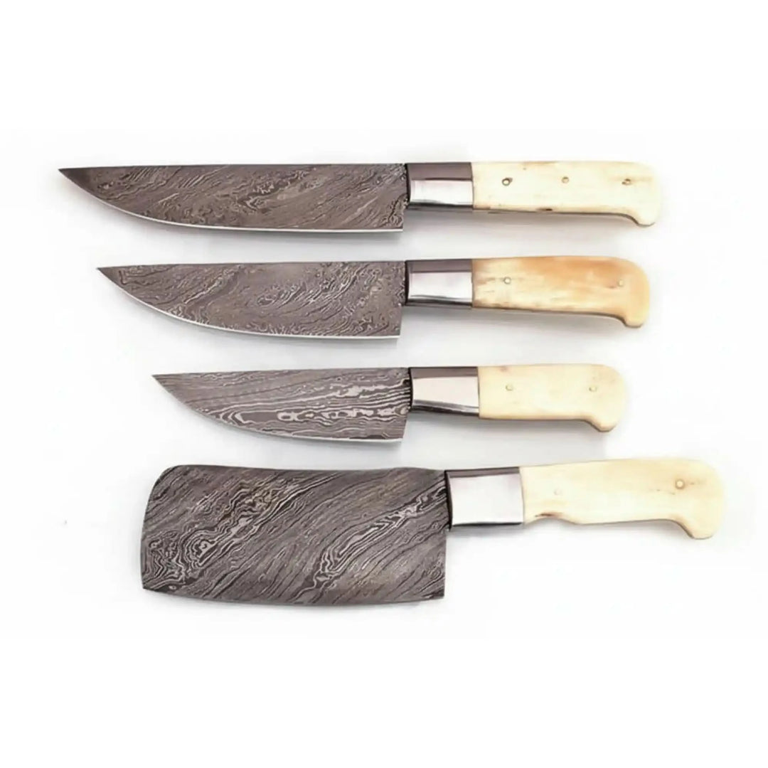 Luxury chef knives featuring intricate layered steel textures and polished cream colored handle styling.