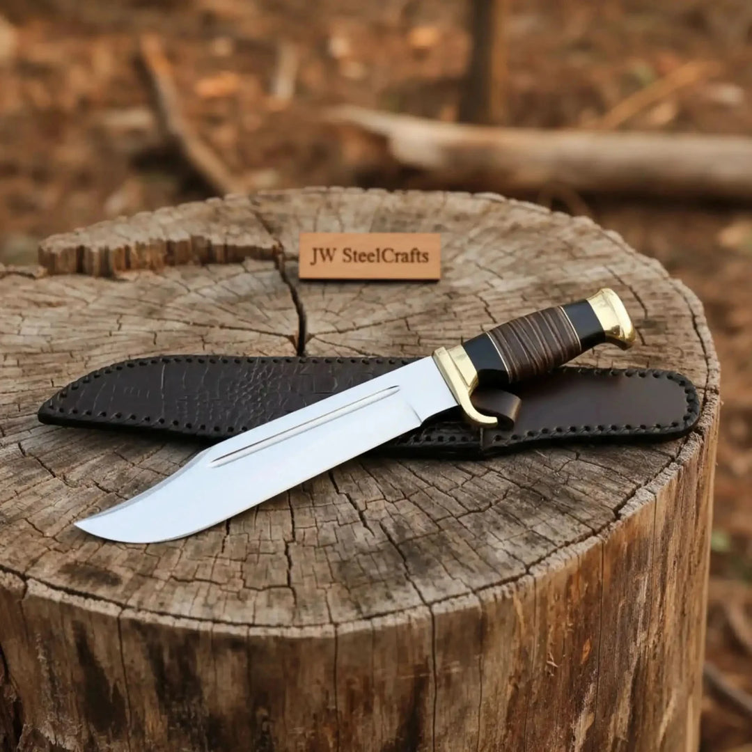 Handcrafted Crocodile Dundee Style Bowie Knife With Leather Sheath On A Wooden Stump