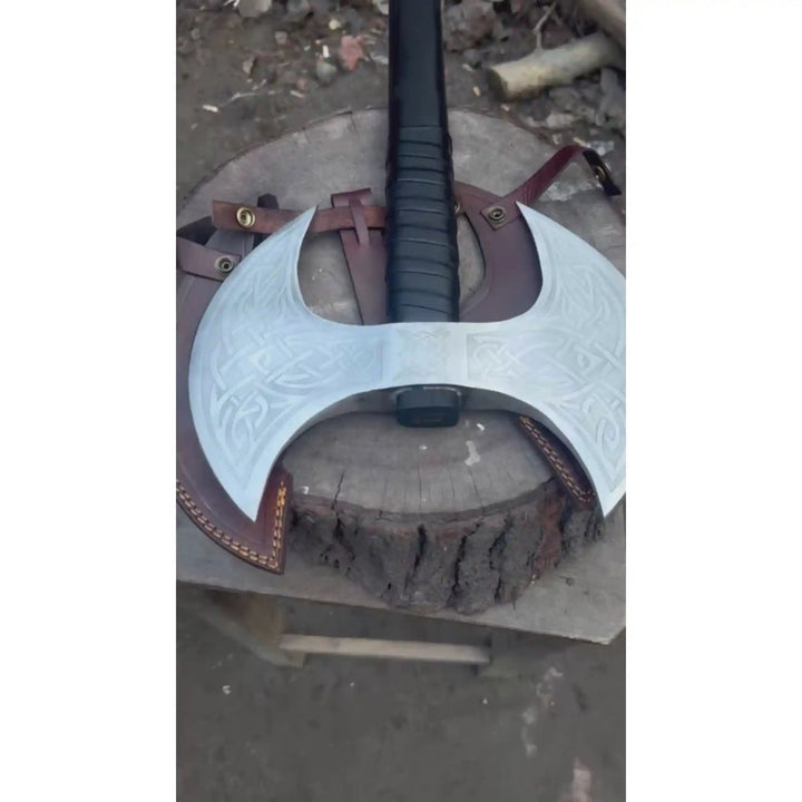 
Closeup of Nordic knotwork and geometric engraving on double-headed Viking axe steel head by JW SteelCrafts


