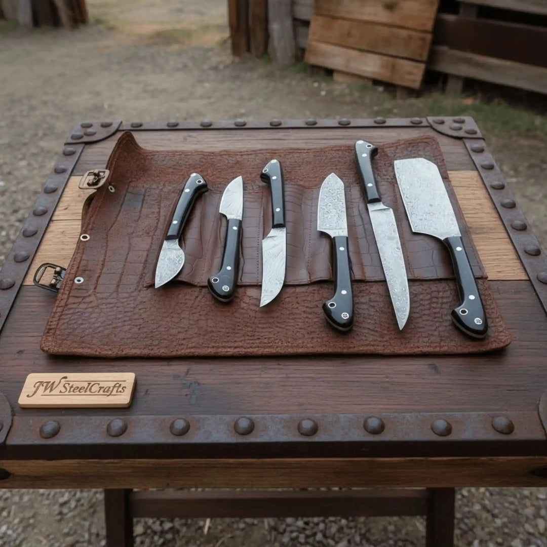 Industrial rustic kitchen tool workshop scene featuring handcrafted cutlery, crocodile leather organizer, and riveted timber table.

