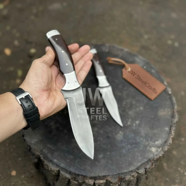 Artisan utility knife with rosewood handle and sharp stainless steel blade close view