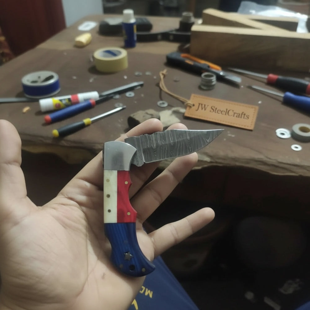 Handmade Damascus Folding Knife – Tricolor Resin Handle (Red, White & Blue) with Leather Sheath handmade Back Lock Folder by JW SteelCrafts