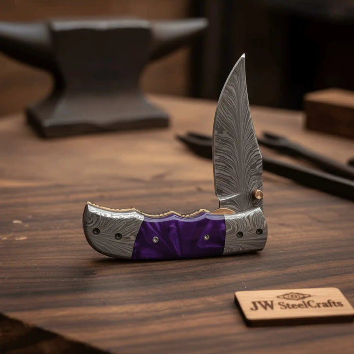 Handmade Feather Pattern Damascus Folding Knife with Purple Resin Handle &amp; Leather Sheath handmade Liner Lock Folder by JW SteelCrafts