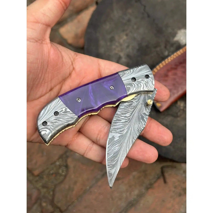Handmade Feather Pattern Damascus Folding Knife with Purple Resin Handle &amp; Leather Sheath handmade Liner Lock Folder by JW SteelCrafts