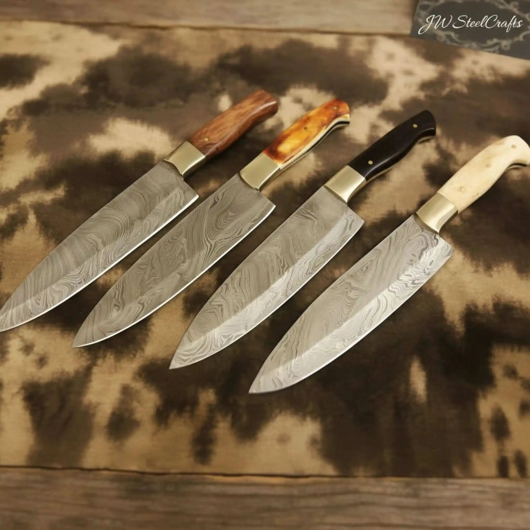 Fine Damascus chef knife display with decorative forged steel patterns and luxurious wood handle finishes.
