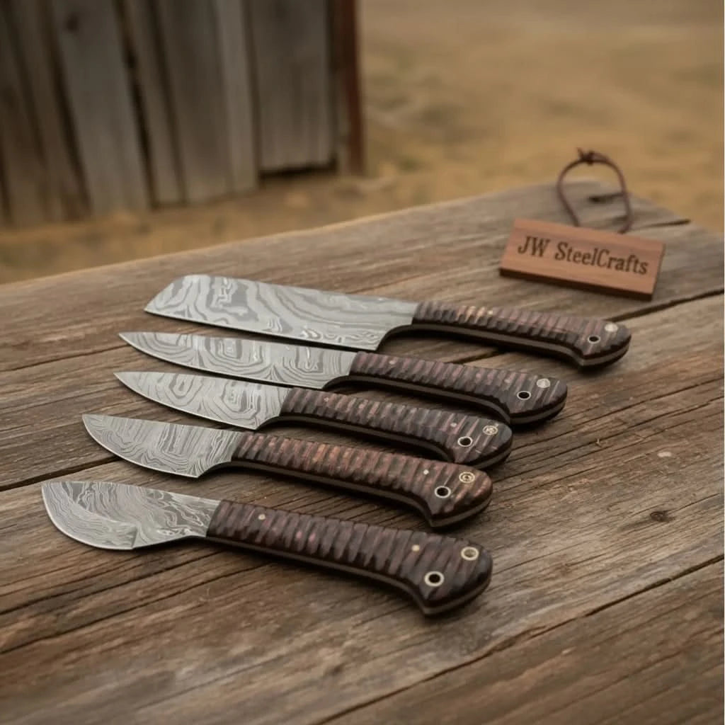 Curved Damascus knife set with decorative patterned blades and dark wood handles.