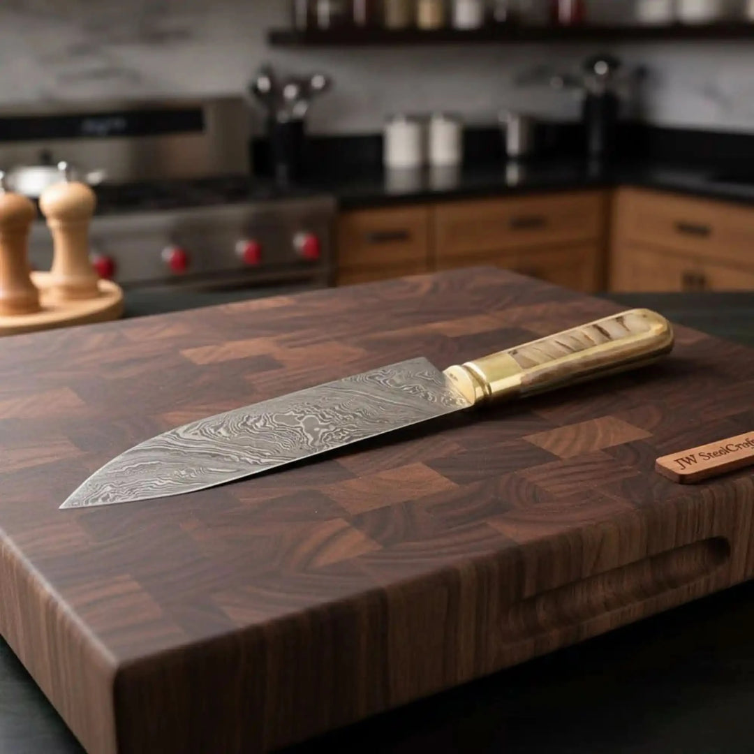 Walnut cutting board utility chef knife scene with JW SteelCrafts tag nearby