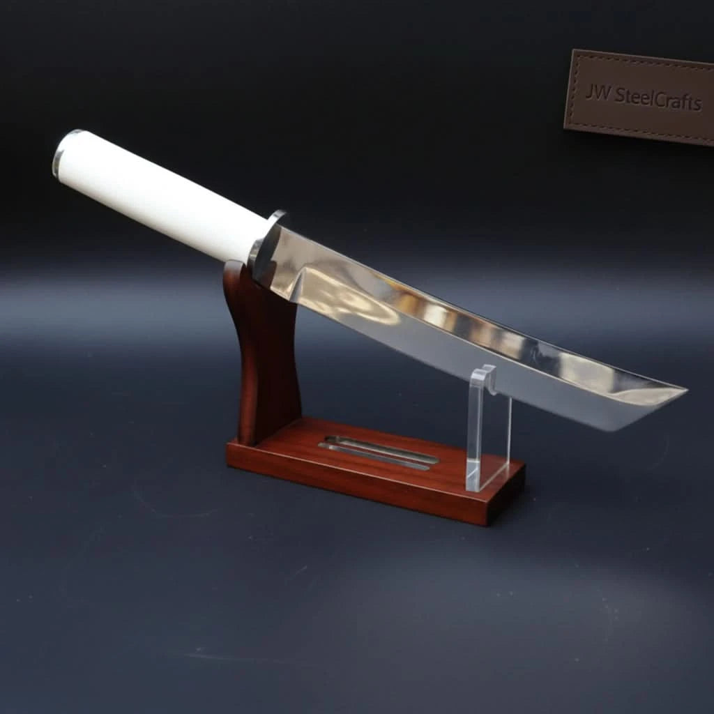 Wooden stand custom short sword display featuring a reflective blade, white grip, and dark studio-style backdrop.