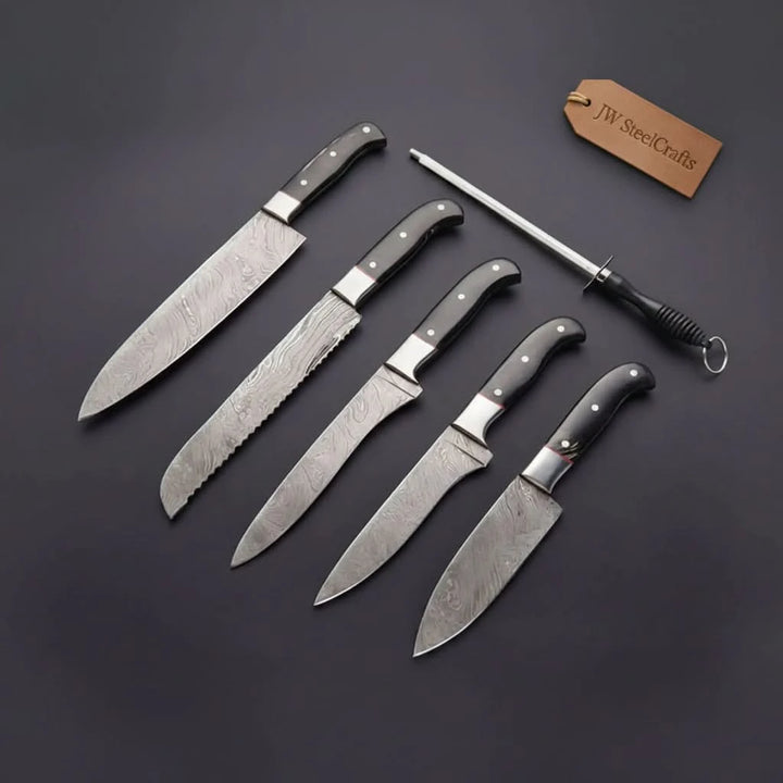 Elegant chef knife arrangement featuring sharp precision cutting edges and decorative Damascus wave pattern detailing.