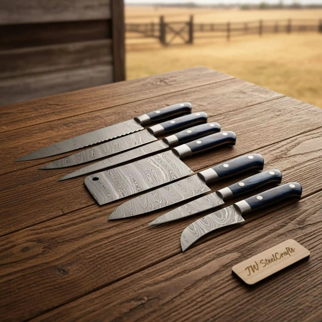 Handmade Damascus kitchen knives featuring layered steel textures and polished black ergonomic grips.