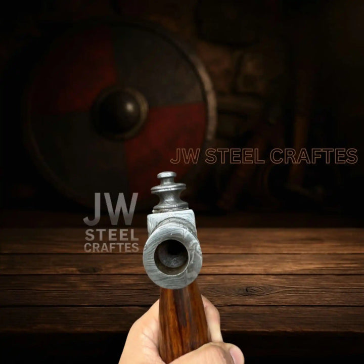 Noble Damascus Viking war axe with elegant steel layering and polished hardwood construction.