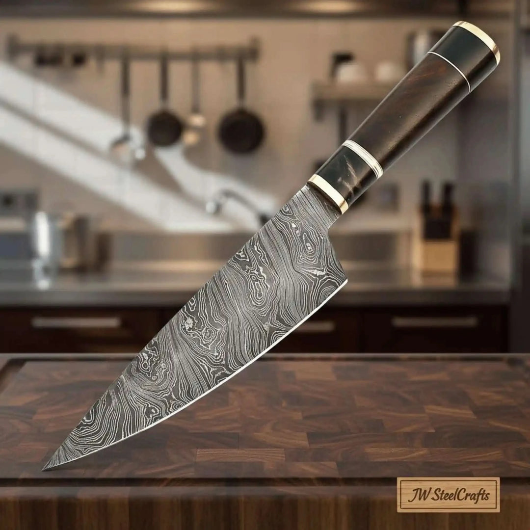 Brown wood grip Damascus knife with black and metal handle accents on a cutting board