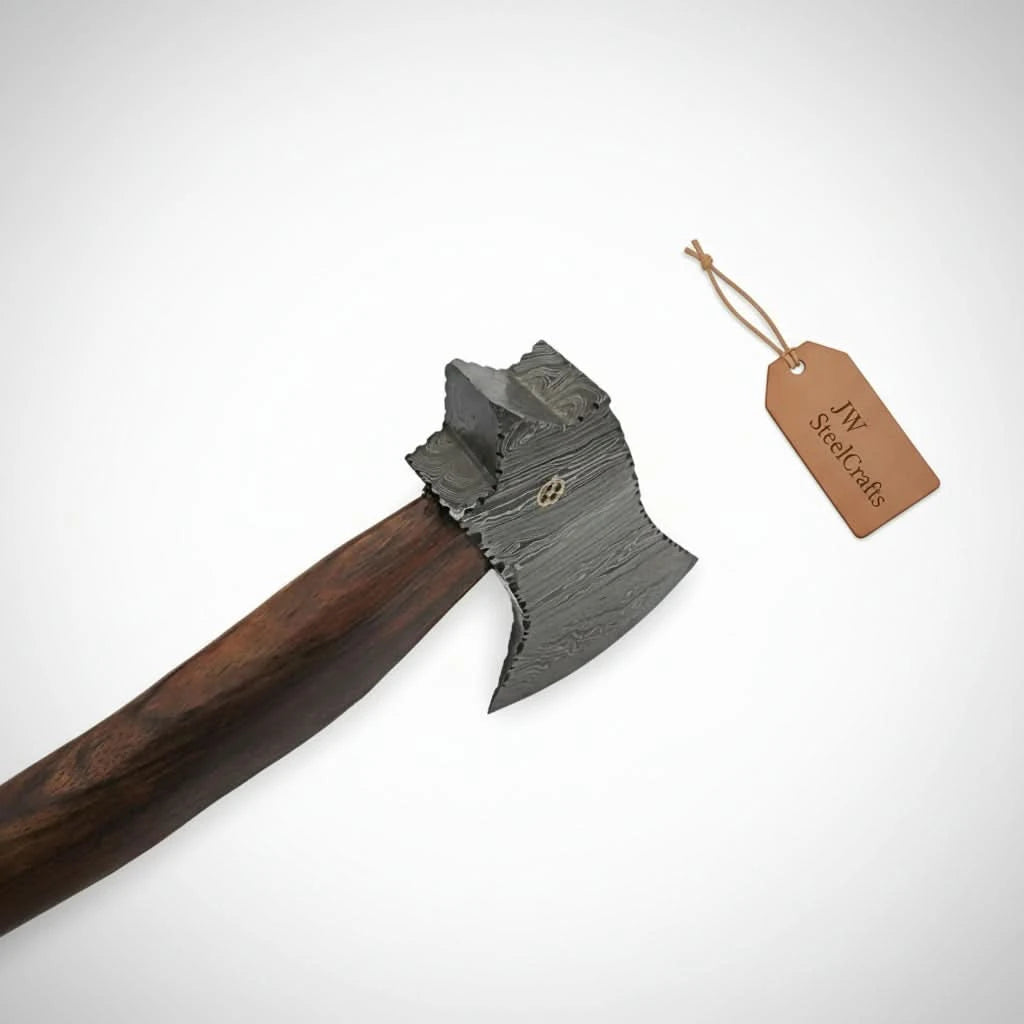 Damascus camp axe blade side profile showing pattern welded grain and mosaic pin detail
