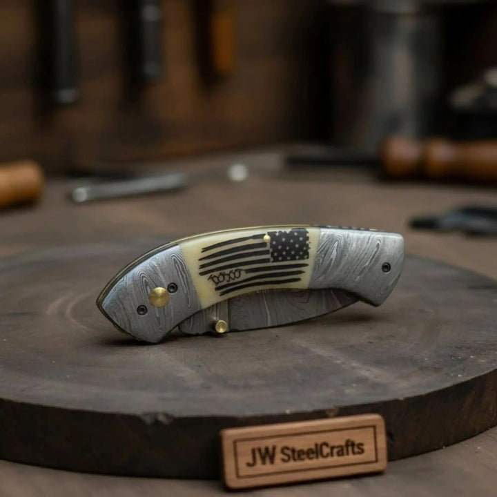     Liberty style compact folding knife designed for daily carry with artistic patriotic handle detail