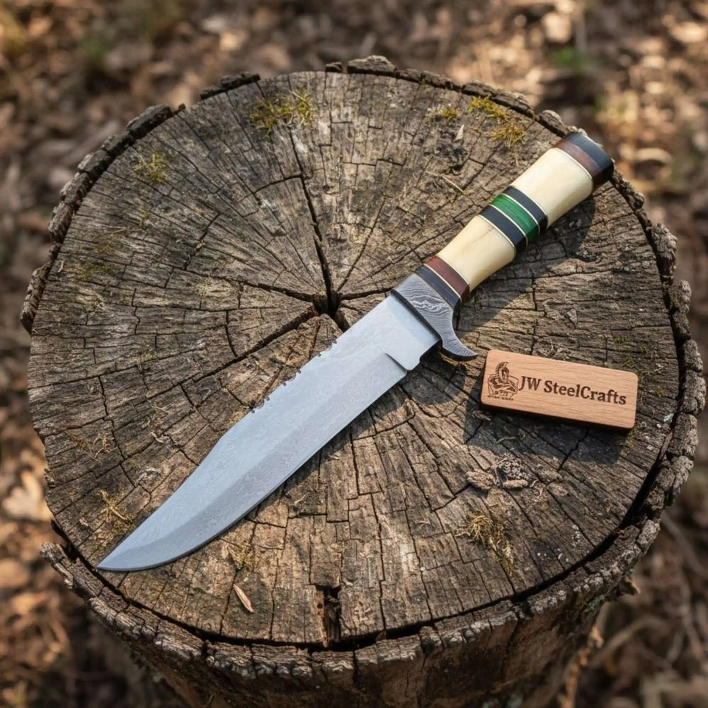 Custom outdoor Bowie knife with tan sheath, long blade, bone handle, and decorative stitched leather cover.