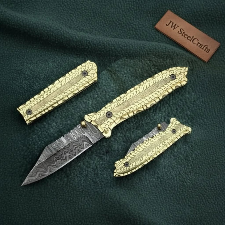     Stylish Damascus folding knife with artisan detail engraving and sharp patterned steel blade finish