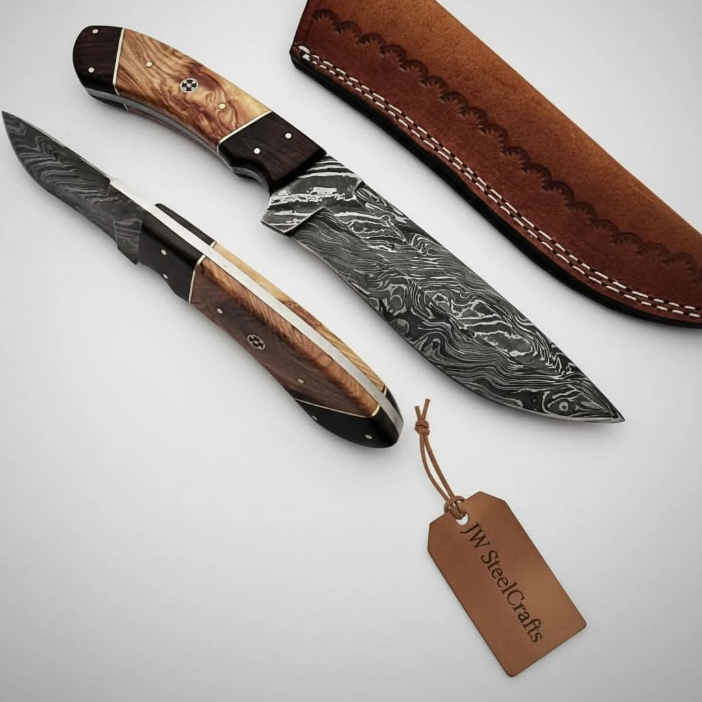 Wood handle Damascus skinning knife with leather case, black spacer accents, patterned blade, and stitched brown sheath.