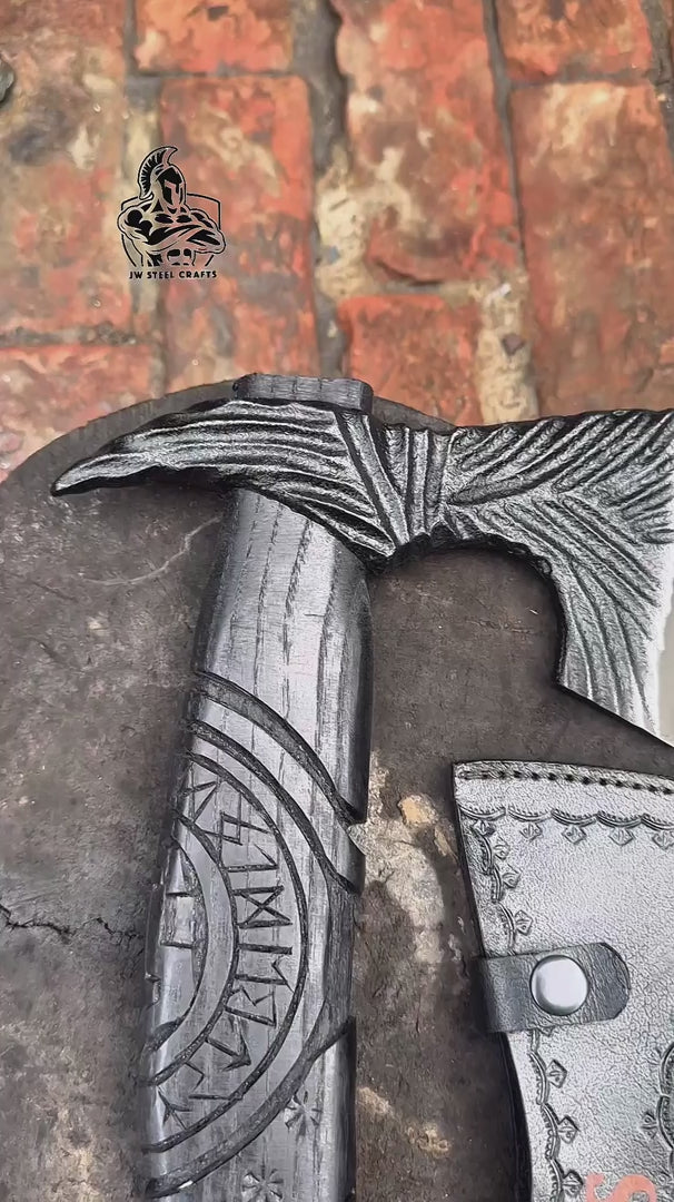 Cedarfang-inspired Viking combat war axe video featuring ornate raven artwork and rustic carved wooden craftsmanship.