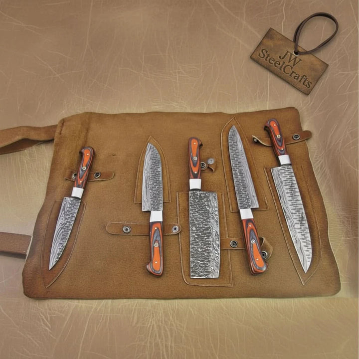 Handcrafted Damascus blades displayed in organized arrangement with unique hammered surface patterns and refined finishes.