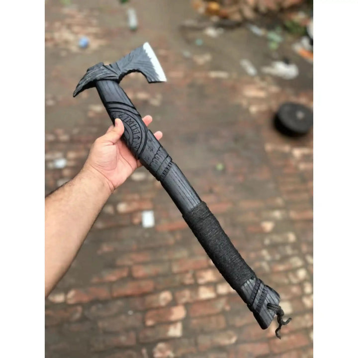 Nordic engraving detail on Viking battle axe high carbon steel head closeup