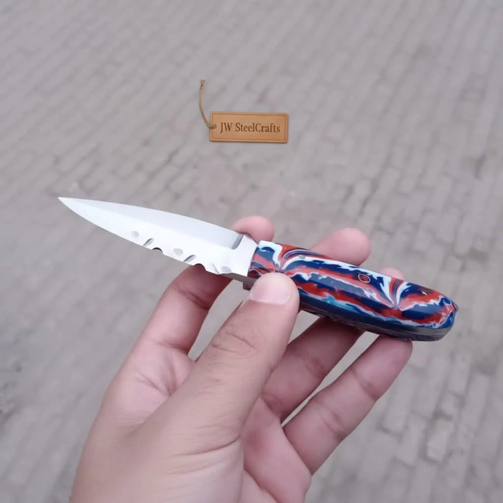 Custom handmade knife photo showing colorful red blue resin handle, dark blade, and JW SteelCrafts branding.