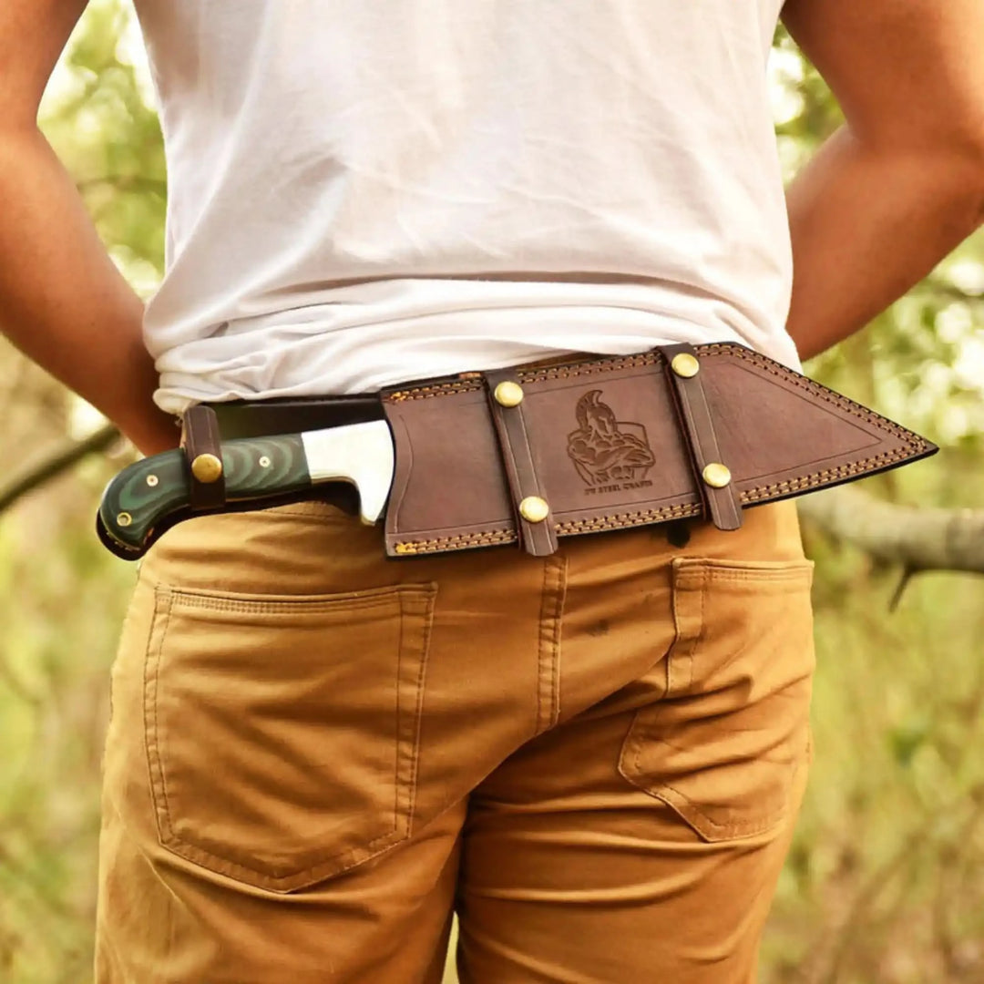     Elite handcrafted knife with secure waist sheath for tactical and wilderness applications