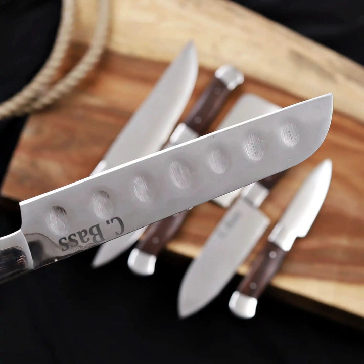 Close up of santoku knife blade from handmade 6 piece full tang chef knife set