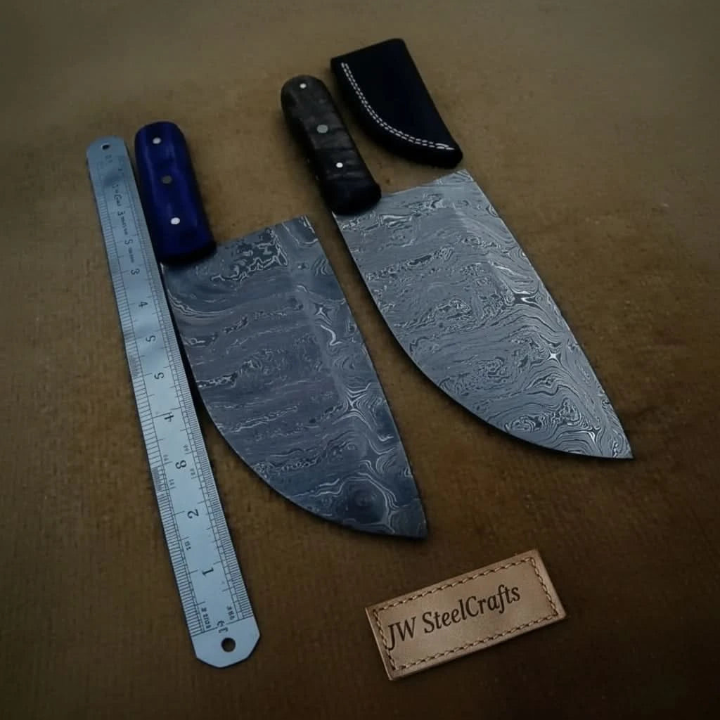 Compact Damascus cleaver set with ruler placed beside wide patterned blades