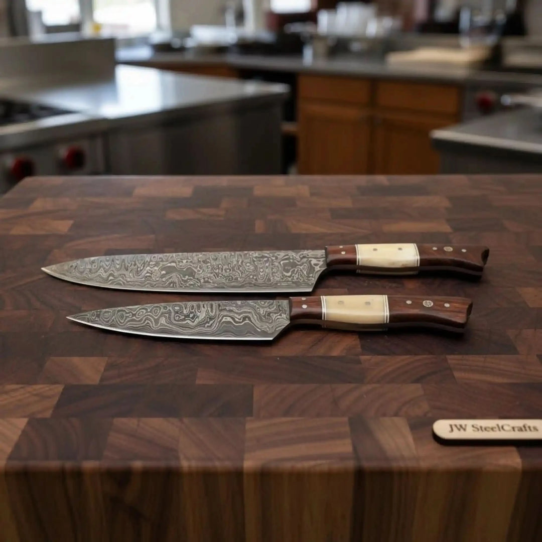 Cream inlay Damascus chef knife set with brown handles and layered steel patterns