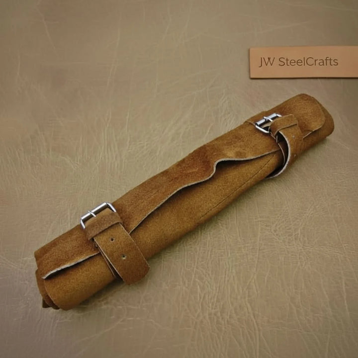 Durable suede kitchen knife case designed for safe transport and organized storage of culinary cutlery tools.
