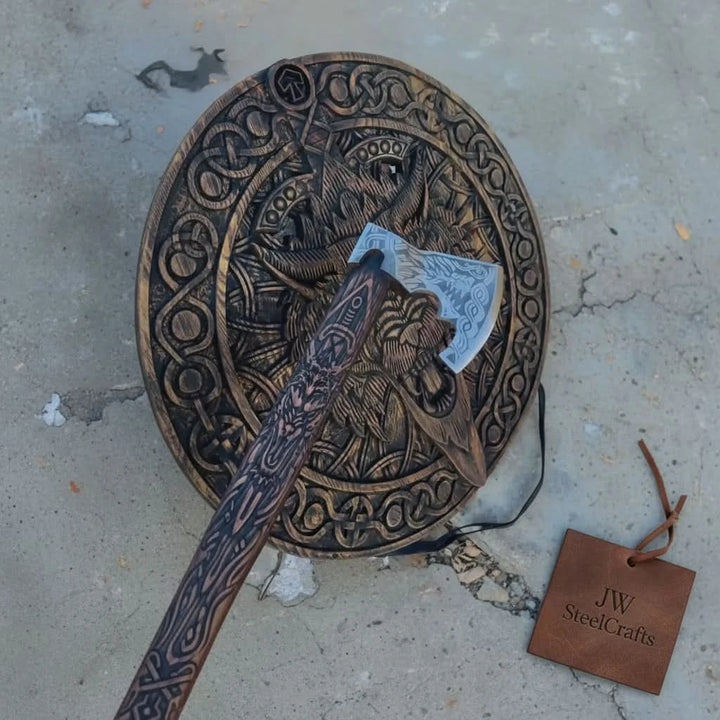 Upland-inspired Viking wooden combat shield featuring artistic wolf face carvings and Nordic circular engravings.
