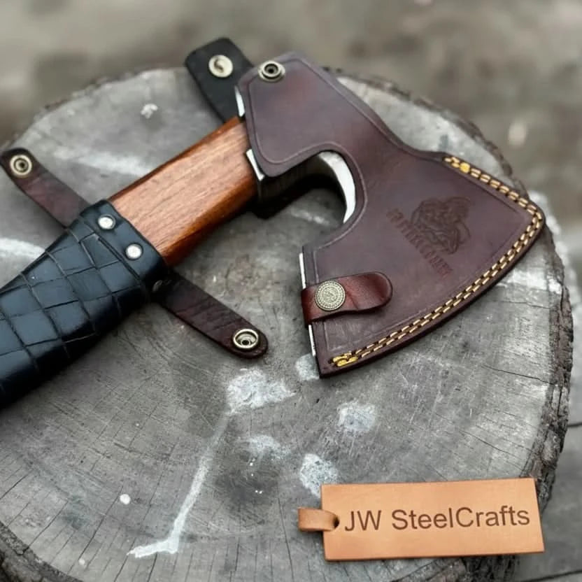 Venomshade-themed Norse battle hatchet displaying polished steel craftsmanship and handcrafted leather details.