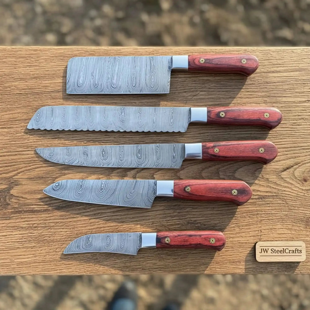 Five handmade kitchen knives featuring layered steel blades and ergonomic grips.