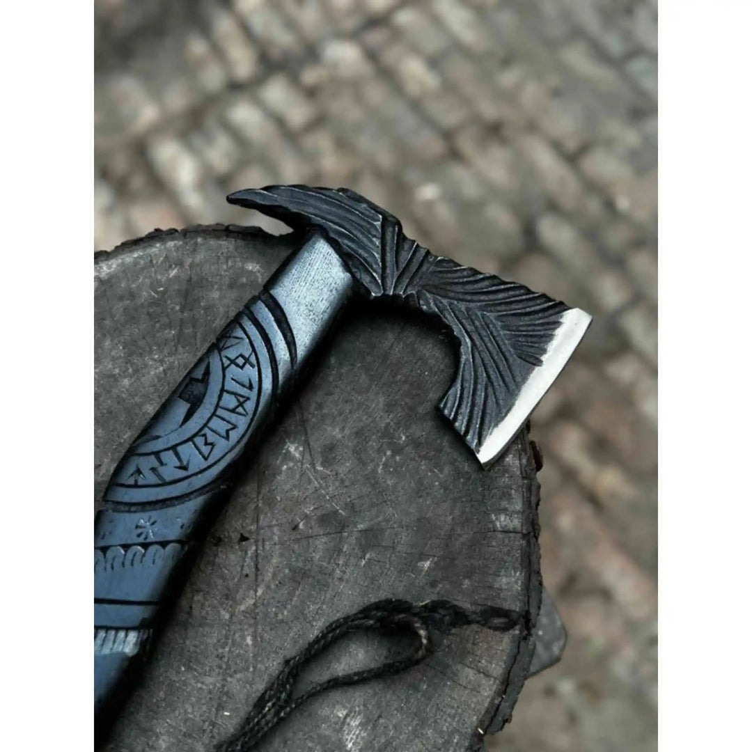 Hand forged Viking battle axe with carved black hardwood handle full view
