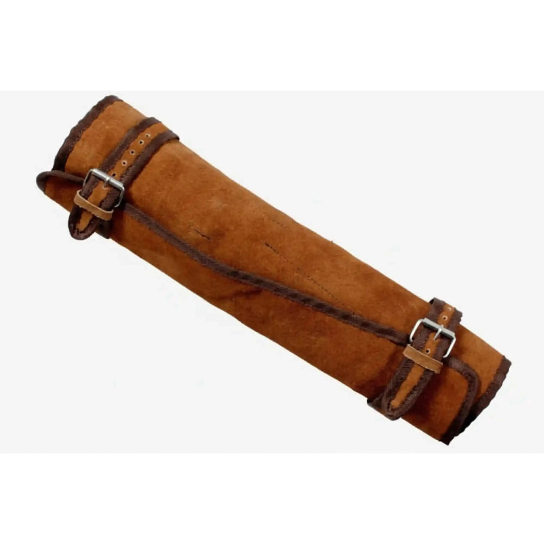 Artisan kitchen knife roll featuring rugged handcrafted appearance and reinforced suede edge detailing.
