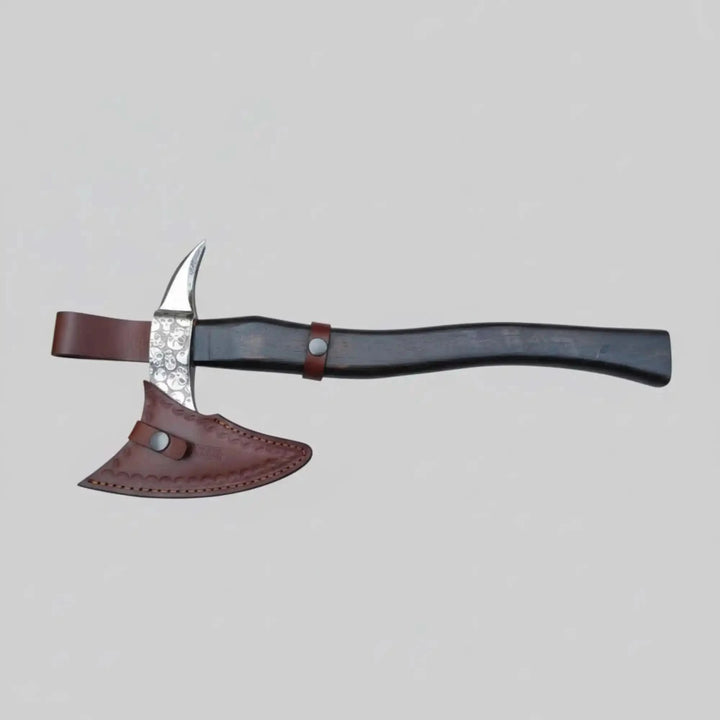 Xandercliff-themed Nordic tactical weapon featuring engraved silver blade and modern black handle outdoors.