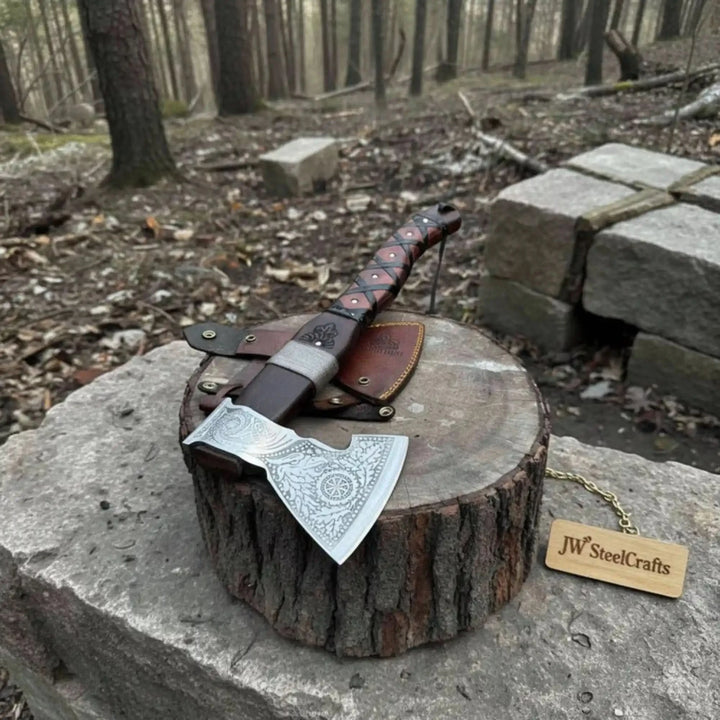 Wildthorn-inspired Viking combat hatchet head showcasing decorative steel engravings and handcrafted Nordic details.