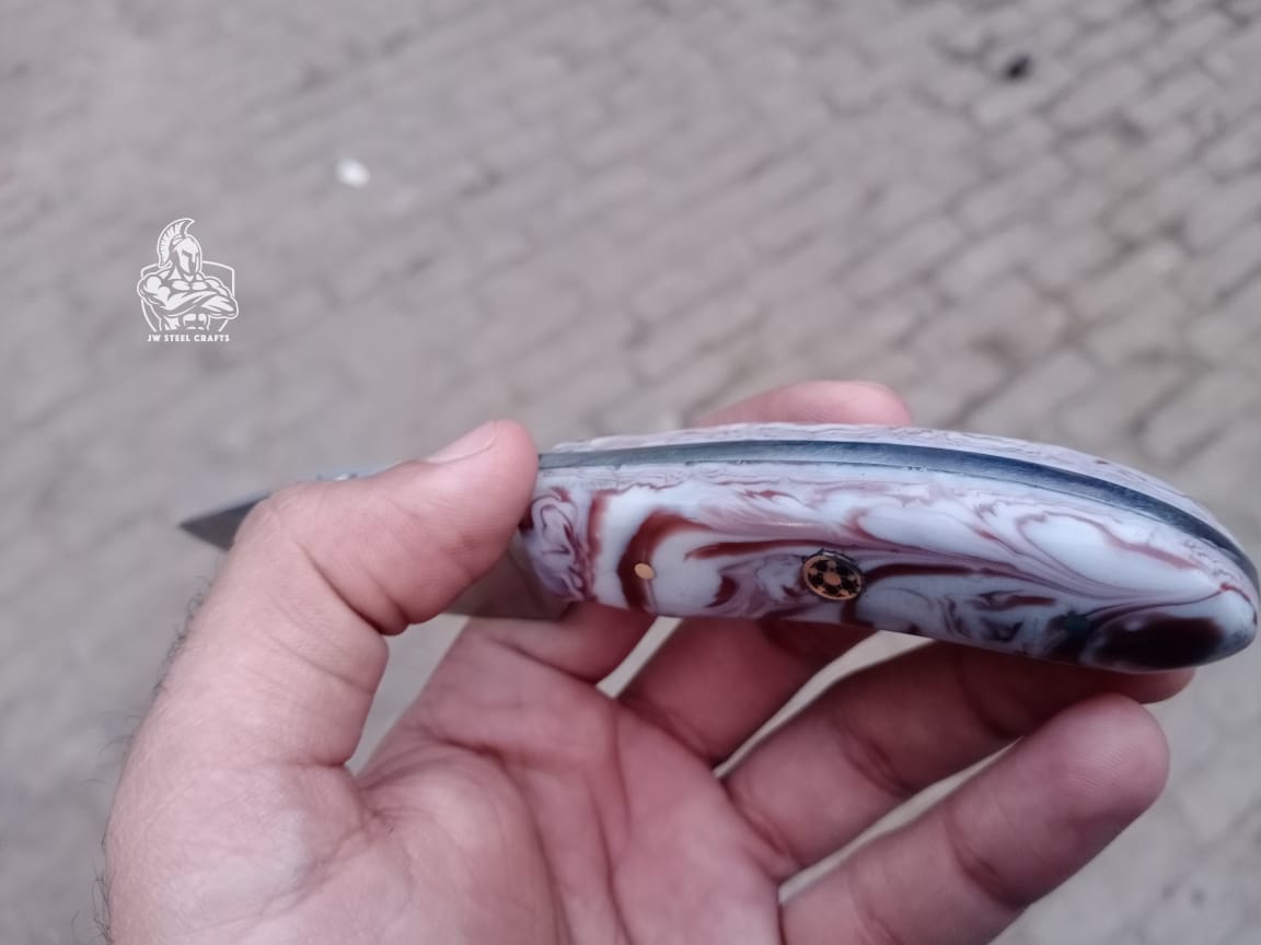 Hand forged Skinner with VG10 handle.