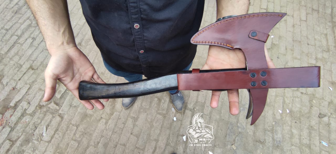 Custom Made Hand Forged Axe With Skull Design.