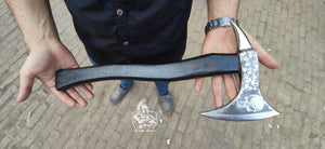 Custom Made Hand Forged Axe With Skull Design.
