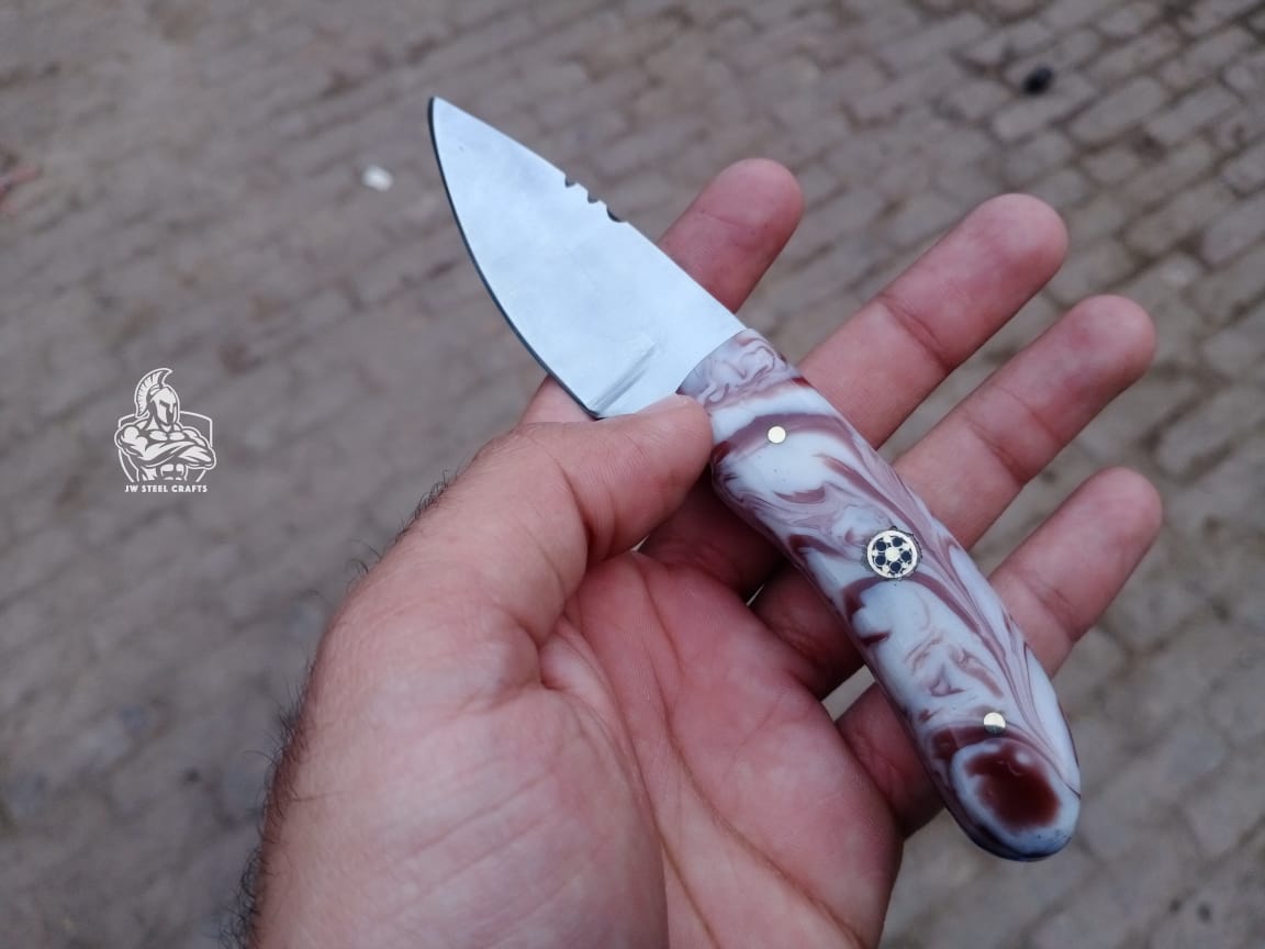 Hand forged Skinner with VG10 handle.