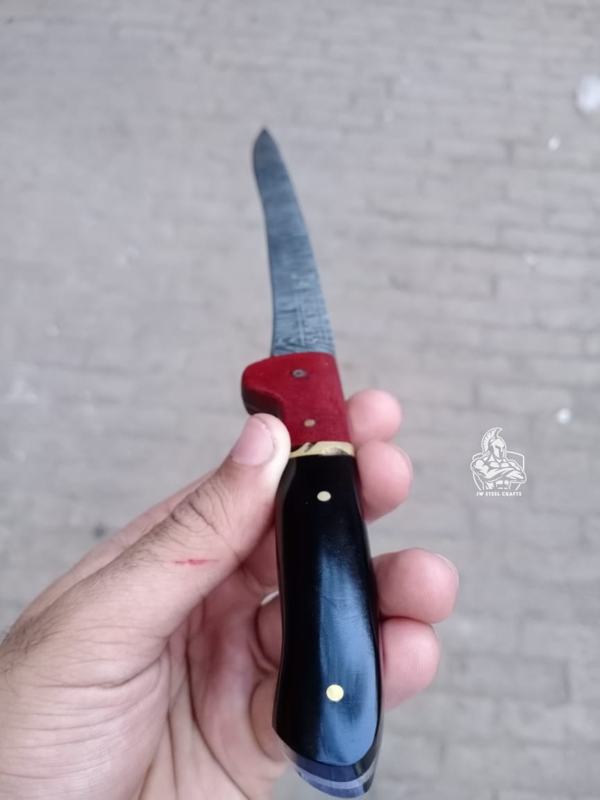 Handmade Boning Knife With Micarta and Black Horn on handle.